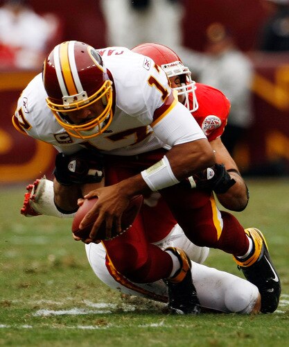 LANDOVER, MD - OCTOBER 18:  Quaterback Jason Campbell #17 of the Washington Redskins is tackled by Mike Vrabel #50 of the  Kansas City Chiefs October 18, 2009 at FedEx Field in Landover, Maryland.The Chiefs won the game 14-6.  <br /><br /><span class="help">(Photo by Win McNamee/Getty Images)</span>