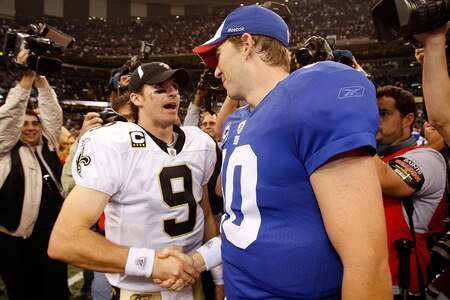 NEW ORLEANS - OCTOBER 18:  Drew Brees #9 of the New Orleans Saints is congratulated by Eli Manning #10 of the New York Giants after the Saints defeated the Giants 48-27  at the Louisiana Superdome on October 18, 2009 in New Orleans, Louisiana.  <br /><br /><span class="help">(Photo by Chris Graythen/Getty Images)</span>