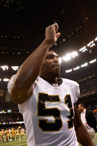 NEW ORLEANS - OCTOBER 18:  Jonathan Vilma #51 of the New Orleans Saints celebrates after defeating the New York Giants 48-27  at the Louisiana Superdome on October 18, 2009 in New Orleans, Louisiana.  <br /><br /><span class="help">(Photo by Chris Graythen/Getty Images)</span>