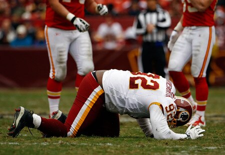 LANDOVER, MD - OCTOBER 18:  Albert Haynesworth #92 the Washington Redskins struggles to get off the field against the Kansas City Chiefs during their game October 18, 2009 at FedEx Field in Landover, Maryland. The Chiefs won the game 14-6.  <br /><br /><span class="help">(Photo by Win McNamee/Getty Images)</span>