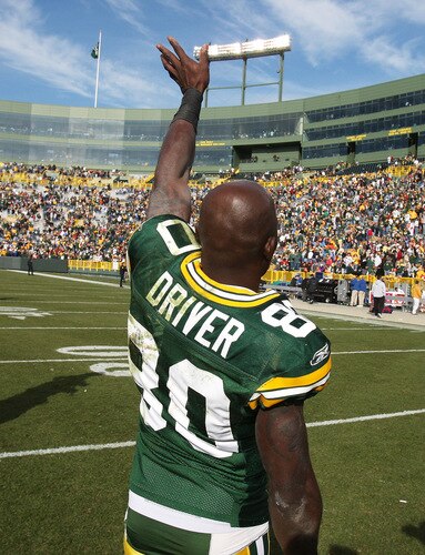 GREEN BAY, WI - OCTOBER 18: Donald Driver #80 of the Green Bay Packers waves to the crowd following a win over the Detroit Lions at Lambeau Field on October 18, 2009 in Green Bay, Wisconsin. The Packers defeated the Lions 26-0. <br /><br /><span class="help">(Photo by Jonathan Daniel/Getty Images)</span>