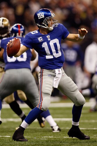 NEW ORLEANS - OCTOBER 18:  Eli Manning #10 of the New York Giants throws a pass against the New Orleans Saints at the Louisiana Superdome on October 18, 2009 in New Orleans, Louisiana. The Saints defeated the Giants 48-27.   <br /><br /><span class="help">(Photo by Chris Graythen/Getty Images)</span>