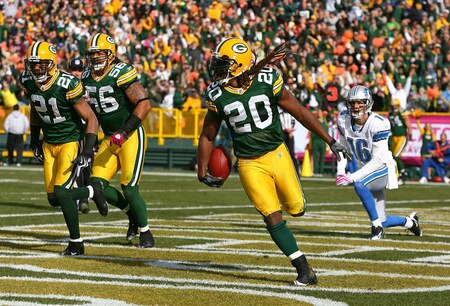 GREEN BAY, WI - OCTOBER 18: Atari Bigby #20 of the Green Bay Packers celebrates an interception in the end zone on a pass intended for John Standeford #16 of the Detroit Lions as teammates Charles Woodson #21 and Nick Barnett#56 run off the field at Lambeau Field on October 18, 2009 in Green Bay, Wisconsin. The Packers defeated the Lions 26-0. <br /><br /><span class="help">(Photo by Jonathan Daniel/Getty Images)</span>