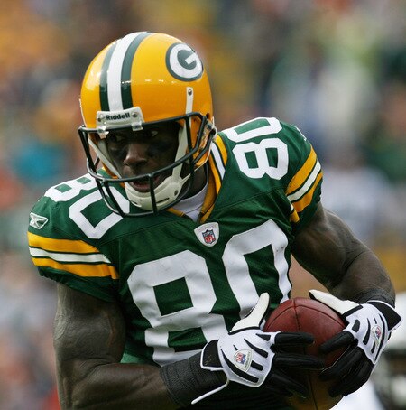 GREEN BAY, WI - OCTOBER 18: Donald Driver #80 of the Green Bay Packers catches a pass against the Detroit Lions at Lambeau Field on October 18, 2009 in Green Bay, Wisconsin. The Packers defeated the Lions 26-0. <br /><br /><span class="help">(Photo by Jonathan Daniel/Getty Images)</span>