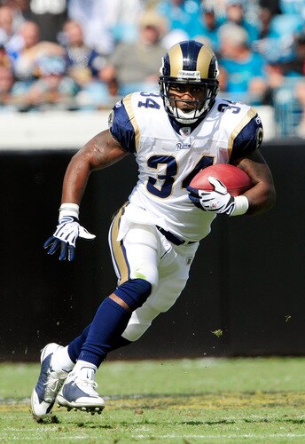 JACKSONVILLE, FL - OCTOBER 18: Kenneth Darby #34 of the St. Louis Rams runs for yardage against the Jacksonville Jaguars at Jacksonville Municipal Stadium on October 18, 2009 in Jacksonville, Florida. <br /><br /><span class="help">(Photo by Sam Greenwood/Getty Images)</span>