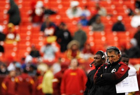 LANDOVER, MD - OCTOBER 18:  Washington Redskins head coach Jim Zorn watches from the sideline as his team loses to the Kansas Chiefs October 18, 2009 at FedEx Field in Landover, Maryland. The Chiefs won the game 14-6.  <br /><br /><span class="help">(Photo by Win McNamee/Getty Images)</span>