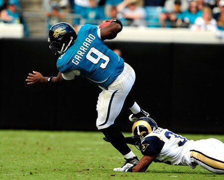 JACKSONVILLE, FL - OCTOBER 18:  David Garrard #9 of the Jacksonville Jaguars is tackled by Bradley Fletcher #32 of the St. Louis Rams during the game at Jacksonville Municipal Stadium on October 18, 2009 in Jacksonville, Florida.  <br /><br /><span class="help">(Photo by Sam Greenwood/Getty Images)</span>