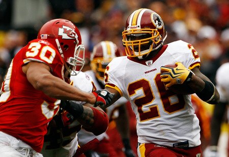 LANDOVER, MD - OCTOBER 18:  Mike Brown #30 of the Kansas City Chiefs tackles Clinton Portis #26 of the Washington Redskins during their game October 18, 2009 at FedEx Field in Landover, Maryland.The Chiefs won the game 14-6.  <br /><br /><span class="help">(Photo by Win McNamee/Getty Images)</span>