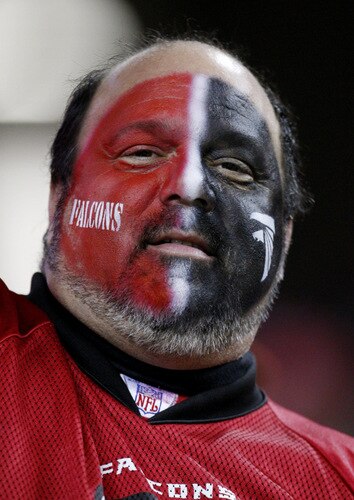 ATLANTA - OCTOBER 18: A fan of the Atlanta Falcons watches warm ups prior to the start of the game against the Chicago Bears at the Georgia Dome on October 18, 2009 in Atlanta, Georgia. <br /><br /><span class="help">(Photo by Kevin C. Cox/Getty Images)</span>