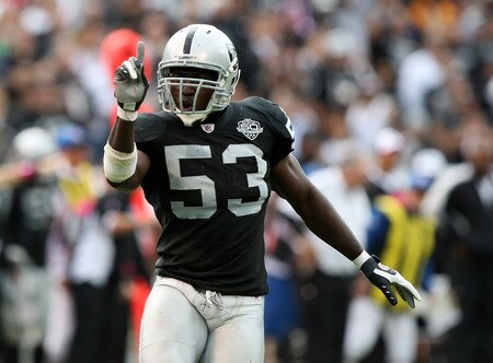 OAKLAND, CA - OCTOBER 18:  Thomas Howard #53 of the Oakland Raiders celebrates after a play against the Philadelphia Eagles during an NFL game at the Oakland-Alameda County Coliseum on October 18, 2009 in Oakland, California.  <br /><br /><span class="help">(Photo by Jed Jacobsohn/Getty Images)</span>