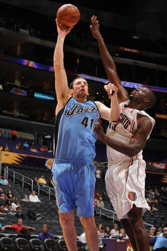 LOS ANGELES - OCTOBER 18:  Kosta Koufos #41 of the Utah Jazz puts up a shot against Nazr Mohammed #13 of the Charlotte Bobcats at Staples Center on October 18, 2009 in Los Angeles, California. <br /><br /><span class="help">(Photo by Noah Graham/NBAE via Getty Images)</span>
