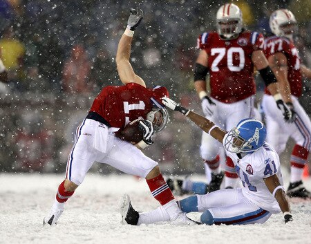 FOXBORO - OCTOBER 18:  Julian Edelman #11 of the New England Patriots is grabbed by Cary Williams #41 of Tennesee Titans at Gillette Stadium on October 18, 2009 in Foxboro, Massachusetts. The Patriots won 59-0. <br /><br /><span class="help">(Photo by Jim Rogash/Getty Images)</span>
