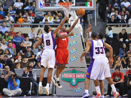 MONTERREY, MEXICO - OCTOBER 18: Thaddeus Young #21 of the Philadelphia 76ers shoots against Channing Frye #8 of the Phoenix Suns during the game on October 18, 2009 at the Arena Monterrey in Monterrey, Mexico.  <br /><br /><span class="help">(Photo by Jesse D. Garrabrant/NBAE via Getty Images)</span>