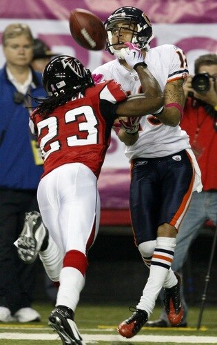 ATLANTA - OCTOBER 18:  Center back Chris Houston #23 of the Atlanta Falcons breaks up a pass tended for wide receiver Johnny Knox #13 of the Chicago Bears in the second quarter of the game at the Georgia Dome on October 18, 2009 in Atlanta, Georgia. <br /><br /><span class="help">(Photo by Kevin C. Cox/Getty Images)</span>
