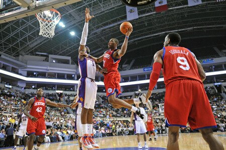 MONTERREY, MEXICO - OCTOBER 18: Thaddeus Young #21 of the Philadelphia 76ers shoots against Amar'e Stoudemire #1 of the Phoenix Suns during the game on October 18, 2009 at the Arena Monterrey in Monterrey, Mexico.  <br /><br /><span class="help">(Photo by Jesse D. Garrabrant/NBAE via Getty Images)</span>