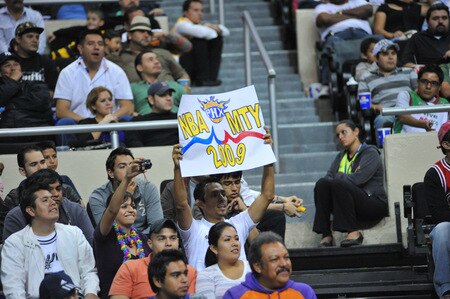 MONTERREY, MEXICO - OCTOBER 18: Fans of the Phoenix Suns cheer against the Philadelphia 76ers during the game on October 18, 2009 at the Arena Monterrey in Monterrey, Mexico.  <br /><br /><span class="help">(Photo by Jesse D. Garrabrant/NBAE via Getty Images)</span>
