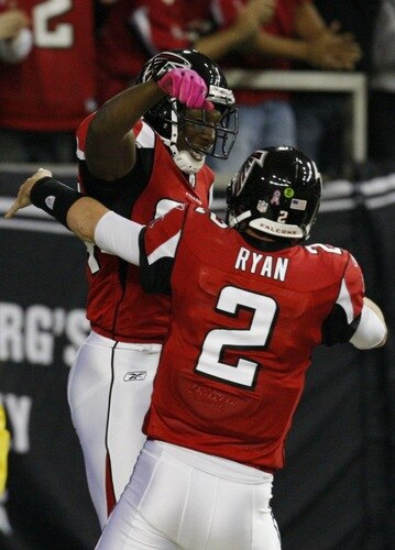 ATLANTA - OCTOBER 18:  Wide receiver Roddy White #84 of the Atlanta Falcons celebrates his 40 yard touchdown with quarterback Matt Ryan #2 during the second quarter of the game against the Chicago Bears at the Georgia Dome on October 18, 2009 in Atlanta, Georgia. <br /><br /><span class="help">(Photo by Kevin C. Cox/Getty Images)</span>