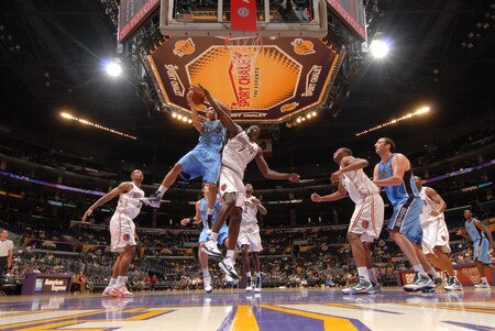 LOS ANGELES - OCTOBER 18:  Eric Maynor #3 of the Utah Jazz has his shot challenged by DeSagana Diop #7 of the Charlotte Bobcats at Staples Center on October 18, 2009 in Los Angeles, California. <br /><br /><span class="help">(Photo by Noah Graham/NBAE via Getty Images)</span>