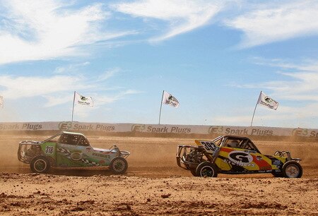 WITTMANN, AZ - OCTOBER 18:  LOORRS limited buggy drivers Ricky Gutierrez (R) and Bryan Freeman compete in the Lucas Oil Off Road Racing Series on October 18, 2009 at the Speedworld Off Road Park in Wittmann, Arizona  <br /><br /><span class="help">(Photo by Christian Petersen/Getty Images)</span>