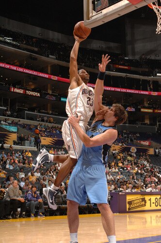 LOS ANGELES - OCTOBER 18:  Stephen Graham #23 of the Charlotte Bobcats goes up for a shot against Kyrylo Fesenko #44 of the Utah Jazz at Staples Center on October 18, 2009 in Los Angeles, California. <br /><br /><span class="help">(Photo by Noah Graham/NBAE via Getty Images)</span>