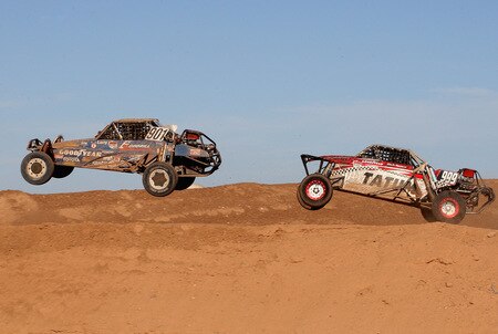 WITTMANN, AZ - OCTOBER 18:  (L-R) LOORRS unlimited buggy drivers Larry Foddrill and Rich Ronco compete in the Lucas Oil Off Road Racing Series on October 18, 2009 at the Speedworld Off Road Park in Wittmann, Arizona  <br /><br /><span class="help">(Photo by Christian Petersen/Getty Images)</span>