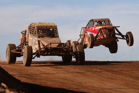 WITTMANN, AZ - OCTOBER 18:  (L-R) LOORRS unlimited buggy drivers Larry Foddrill and Tim Herbst compete in the Lucas Oil Off Road Racing Series on October 18, 2009 at the Speedworld Off Road Park in Wittmann, Arizona  <br /><br /><span class="help">(Photo by Christian Petersen/Getty Images)</span>