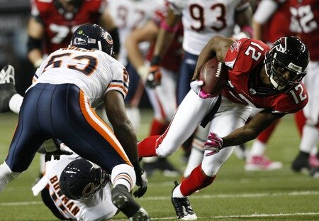 ATLANTA - OCTOBER 18:  Michael Jenkins #12 of the Atlanta Falcons gets the first down against the Chicago Bears in the second half of the game at the Georgia Dome on October 18, 2009 in Atlanta, Georgia. The Falcons won 21-14. <br /><br /><span class="help">(Photo by Kevin C. Cox/Getty Images)</span>