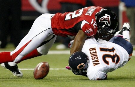 ATLANTA - OCTOBER 18:  Nathan Vasher #31 of the Chicago Bears intercepts the ball but fumbles it under  Michael Jenkins #12 of the Atlanta Falcons in the second half of the game at the Georgia Dome on October 18, 2009 in Atlanta, Georgia. The Falcons won 21-14. <br /><br /><span class="help">(Photo by Kevin C. Cox/Getty Images)</span>