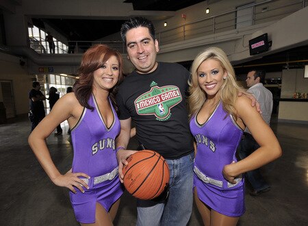 MONTERREY, MEXICO - OCTOBER 18: A NBA  fan poses with two members of the Suns dance team prior to the preseason game between the Phoenix Suns and the Philadelphia 76ers at Arena Monterrey on October 18, 2009 in Monterrey, Nuevo Leon, Mexico. <br /><br /><span class="help">(Photo by David Dow/NBAE via Getty Images)</span>