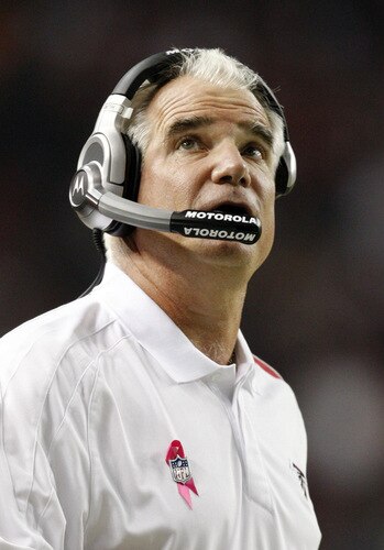 ATLANTA - OCTOBER 18:  Head coach Mike Smith of the Atlanta Falcons looks up at the scoreboard in the fourth quarter of the game against the Chicago Bears at the Georgia Dome on October 18, 2009 in Atlanta, Georgia. The Falcons won the game 21-14. <br /><br /><span class="help">(Photo by Kevin C. Cox/Getty Images)</span>