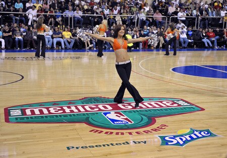 MONTERREY, MEXICO - OCTOBER 18:  A member of the Suns dance team performs during the Phoenix Suns preseason NBA game against the Philadelphia 76ers at Arena Monterrey on October 18, 2009 in Monterrey, Nuevo Leon, Mexico. <br /><br /><span class="help">(Photo by David Dow/NBAE via Getty Images)</span>