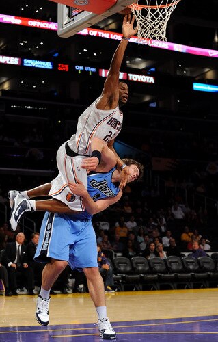 LOS ANGELES, CA - OCTOBER 18:  Stephen Graham #23 of the Charlotte Bobcats drives to the basket against Kyrylo Fesenko #44 of the Utah Jazz durng a preseason game at Staples Center on October 18, 2009 in Los Angeles, California.  <br /><br /><span class="help">(Photo by Lisa Blumenfeld/NBAE/Getty Images)</span>