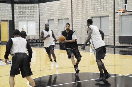 SAN ANTONIO - OCTOBER 19: Tim Duncan of the San Antonio Spurs looks to pass during training camp on October 19, 2009 at the AT&T Center in San Antonio, Texas. <br /><br /><span class="help">(Photo by D. Clarke Evans/NBAE via Getty Images)</span>