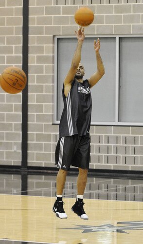 SAN ANTONIO - OCTOBER 19: Tony Parker  of the San Antonio Spurs puts up a shot during training camp on October 19, 2009 at the AT&T Center in San Antonio, Texas. <br /><br /><span class="help">(Photo by D. Clarke Evans/NBAE via Getty Images)</span>