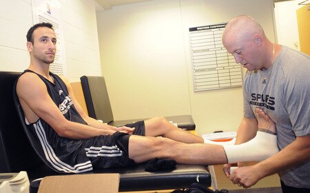 SAN ANTONIO - OCTOBER 19: Manu Ginobili of the San Antonio Spurs gets taped during training camp on October 19, 2009 at the AT&T Center in San Antonio, Texas. <br /><br /><span class="help">(Photo by D. Clarke Evans/NBAE via Getty Images)</span>