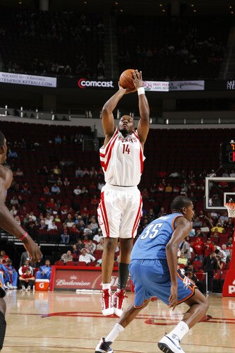 HOUSTON - OCTOBER 19: Carl Landry #14 of the Houston Rockets shoots the ball over Kevin Durant #35 of the Oklahoma City Thunder on October 19, 2009 at the Toyota Center in Houston, Texas. <br /><br /><span class="help">(Photo by Bill Baptist/NBAE via Getty Images)</span>