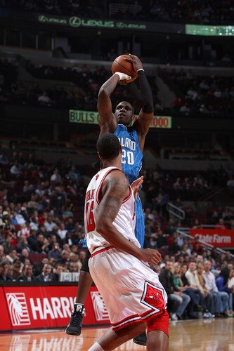CHICAGO - OCTOBER 19: Mikael Pietrus #20 of the Orlando Magic shoots a jumpshot against James Johnson #16 of the Chicago Bulls during a pre-season game on October 19, 2009 at the United Center in Chicago, Illinois.  <br /><br /><span class="help">(Photo by Gary Dineen/NBAE via Getty Images)</span>
