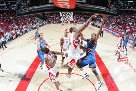 HOUSTON - OCTOBER 19: Thabo Sefolosha #2 of the Oklahoma City Thunder shoots the ball over Chuck Hayes #44 of the Houston Rockets on October 19, 2009 at the Toyota Center in Houston, Texas. <br /><br /><span class="help">(Photo by Bill Baptist/NBAE via Getty Images)</span>