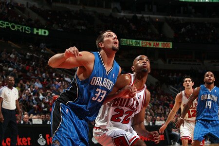 CHICAGO - OCTOBER 19: Ryan Anderson #33 of the Orlando Magic battles for position with Taj Gibson #22 of the Chicago Bulls during a pre-season game on October 19, 2009 at the United Center in Chicago, Illinois.  <br /><br /><span class="help">(Photo by Gary Dineen/NBAE via Getty Images)</span>