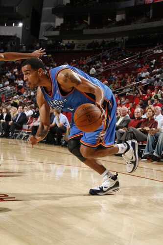 HOUSTON - OCTOBER 19: Thabo Sefolosha #2 of the Oklahoma City Thunder drives the ball against the Houston Rockets on October 19, 2009 at the Toyota Center in Houston, Texas. <br /><br /><span class="help">(Photo by Bill Baptist/NBAE via Getty Images)</span>