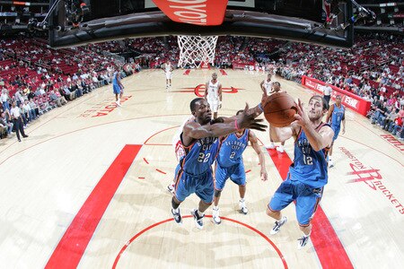 HOUSTON - OCTOBER 19: Jeff Green #22 and Nenad Krstic #12 of the Oklahoma City Thunder rebound the ball against the Houston Rockets on October 19, 2009 at the Toyota Center in Houston, Texas. <br /><br /><span class="help">(Photo by Bill Baptist/NBAE via Getty Images)</span>