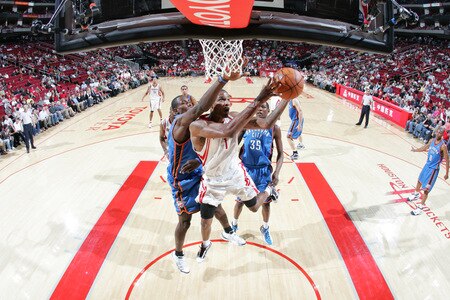 HOUSTON - OCTOBER 19: Trevor Ariza #1 of the Houston Rockets shoots the ball over Kevin Durant #35 of the Oklahoma City Thunder on October 19, 2009 at the Toyota Center in Houston, Texas. <br /><br /><span class="help">(Photo by Bill Baptist/NBAE via Getty Images)</span>