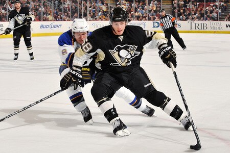 PITTSBURGH - OCTOBER 20:  Kris Letang #58 of the Pittsburgh Penguins controls the puck in front of Erik Johnson #6 of the St. Louis Blues on October 20, 2009 at Mellon Arena in Pittsburgh, Pennsylvania.  <br /><br /><span class="help">(Photo by Jamie Sabau/Getty Images)</span>