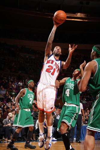 NEW YORK - OCTOBER 20: Wilson Chandler #21 of the New York Knicks shoots against the Boston Celtics on October 20, 2009 at Madison Square Garden in New York City. <br /><br /><span class="help">(Photo by Nathaniel S. Butler/NBAE via Getty Images)</span>