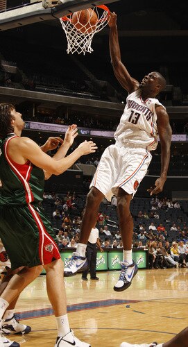 CHARLOTTE, NC - OCTOBER 20:  Nazr Mohammed #13 of the Charlotte Bobcats dunks against the Milwaukee Bucks on October 20, 2009 at Time Warner Cable Arena in Charlotte, North Carolina.  <br /><br /><span class="help">(Photo by Kent Smith/NBAE via Getty Images)</span>