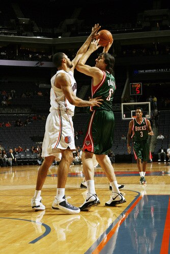 CHARLOTTE, NC - OCTOBER 20:  Nazr Mohammed #13 of the Charlotte Bobcats guards against Andrew Bogut #6 of the Milwaukee Bucks on October 20, 2009 at Time Warner Cable Arena in Charlotte, North Carolina.  <br /><br /><span class="help">(Photo by Brock Williams-Smith/NBAE via Getty Images)</span>