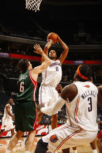 CHARLOTTE, NC - OCTOBER 20:  Tyson Chandler #6 of the Charlotte Bobcats shoots a jump shot against Andrew Bogut #6 of the Milwaukee Bucks on October 20, 2009 at Time Warner Cable Arena in Charlotte, North Carolina.  <br /><br /><span class="help">(Photo by Kent Smith/NBAE via Getty Images)</span>
