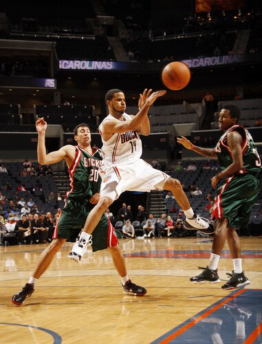 CHARLOTTE, NC - OCTOBER 20:  D.J. Augustin #14 of the Charlotte Bobcats makes a pass against the Milwaukee Bucks on October 20, 2009 at Time Warner Cable Arena in Charlotte, North Carolina.  <br /><br /><span class="help">(Photo by Kent Smith/NBAE via Getty Images)</span>