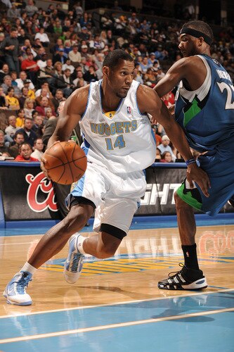 DENVER - OCTOBER 20: Joey Graham #14 of the Denver Nuggets goes to the basket against Corey Brewer #22 of the Minnesota Timberwolves on October 20, 2009 at the Pepsi Center in Denver, Colorado. <br /><br /><span class="help">(Photo by Garrett W. Ellwood/NBAE via Getty Images)</span>