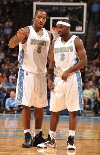 DENVER - OCTOBER 20: J.R. Smith #5 and Ty Lawson #3 of the Denver Nuggets talk together during a time out against the Minnesota Timberwolves on October 20, 2009 at the Pepsi Center in Denver, Colorado. <br /><br /><span class="help">(Photo by Garrett W. Ellwood/NBAE via Getty Images)</span>